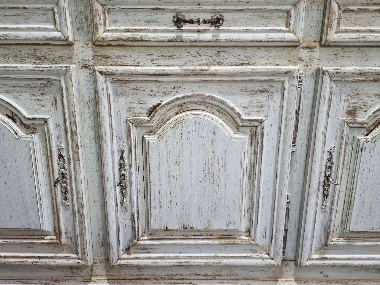 19th Century French painted three door oak buffet. Plenty of storage space with three drawers and doors. In good original condition.
