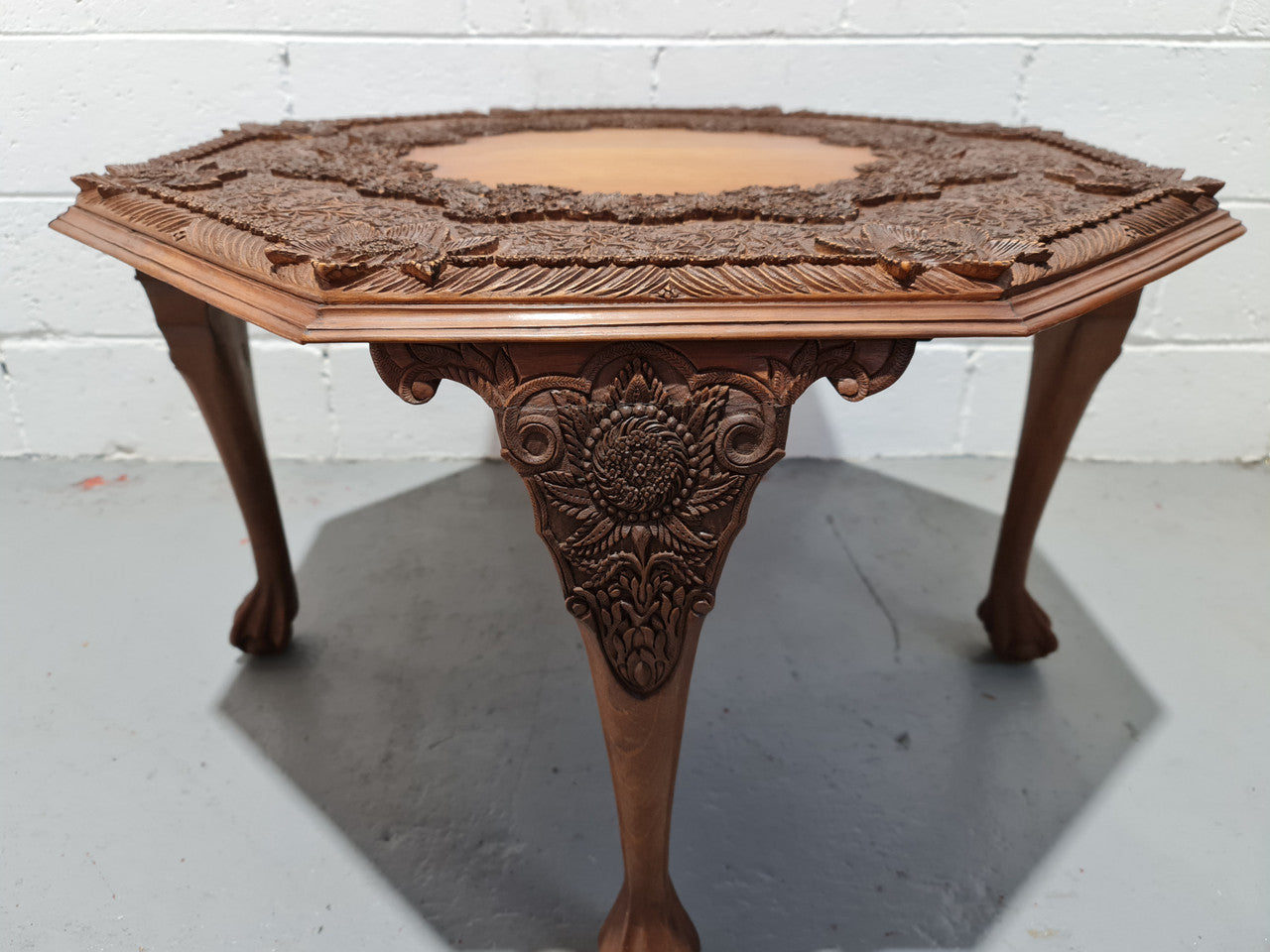 Heavily carved Teakwood round Chinese coffee table. In good original detailed condition. Circa: 1920