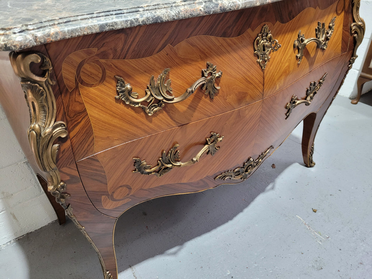 Stunning French Walnut and Rosewood Louis XV style two drawer commode with a beautiful marble top and ormolu mounts. In good original detailed condition.
