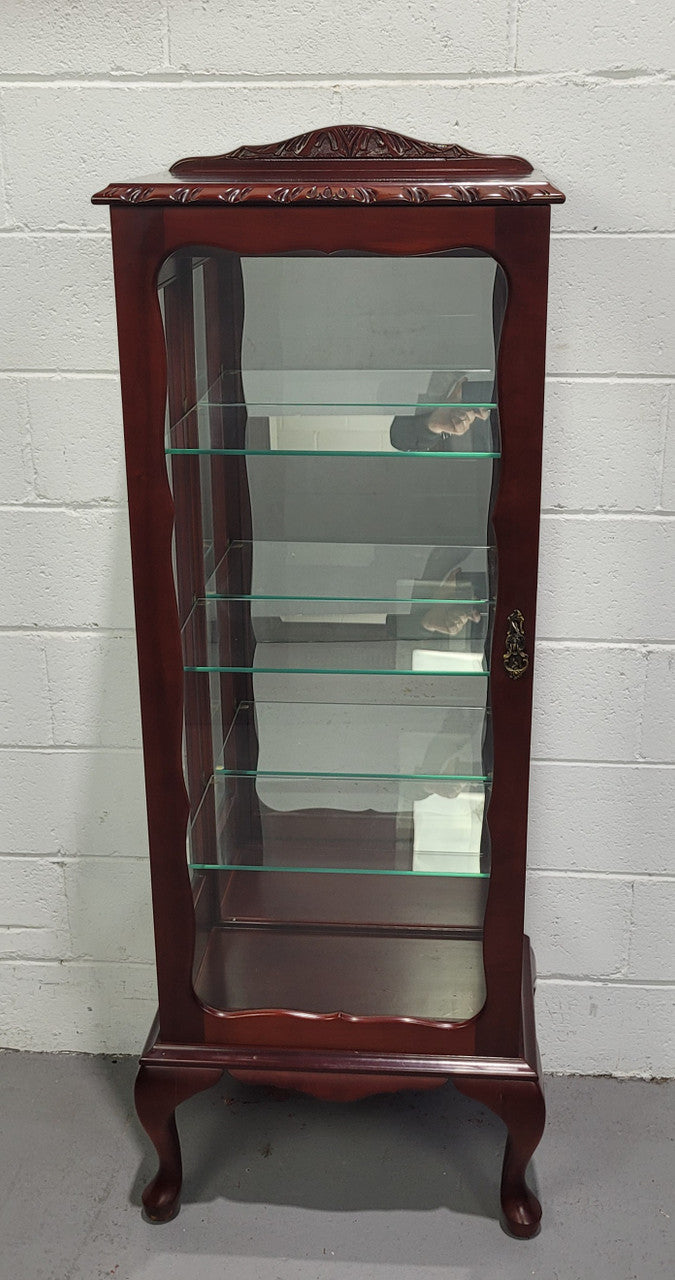Vintage Mahogany petite display cabinet with three solid glass shelves. Ideal for a small area and is in good original detailed condition.