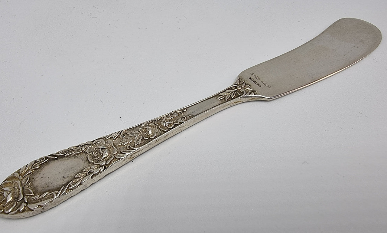 Very decorative American Kirk and Sons sterling silver butter knife in good original condition.