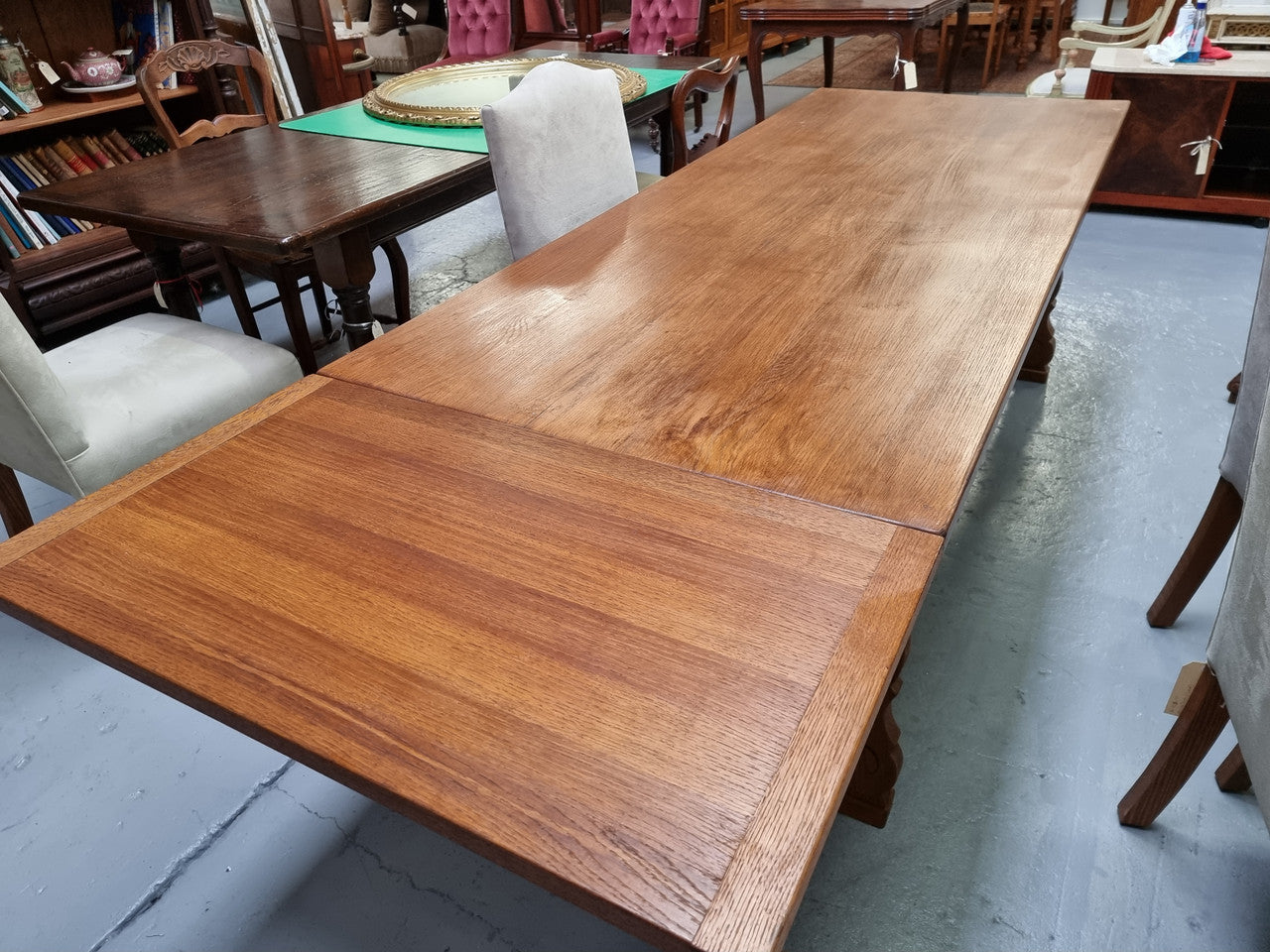 French light Oak Spanish style extension table. In good restored condition.