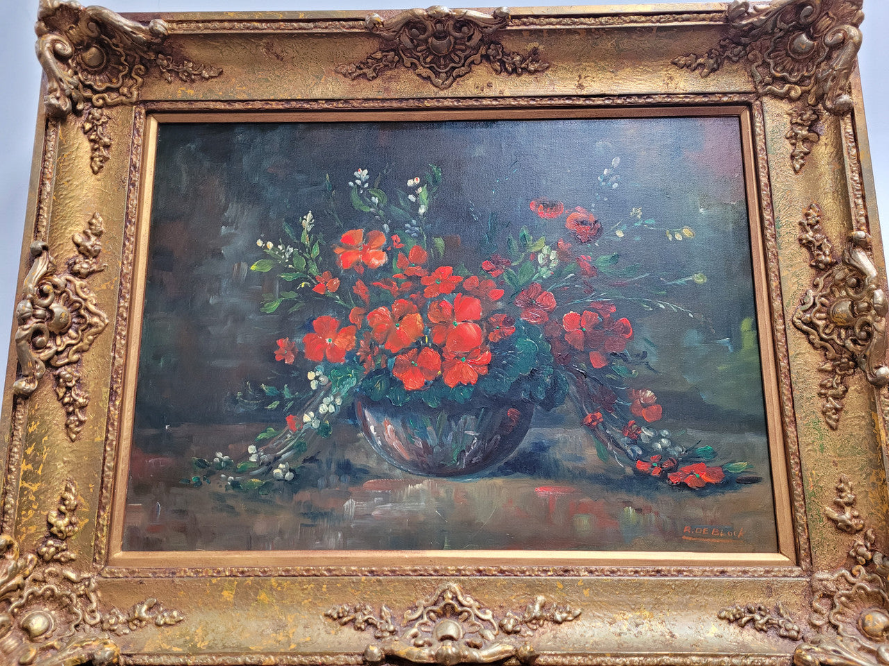 Signed oil on canvas of a charming floral arrangement in vase with ornate gilt frame. In good original detailed condition.