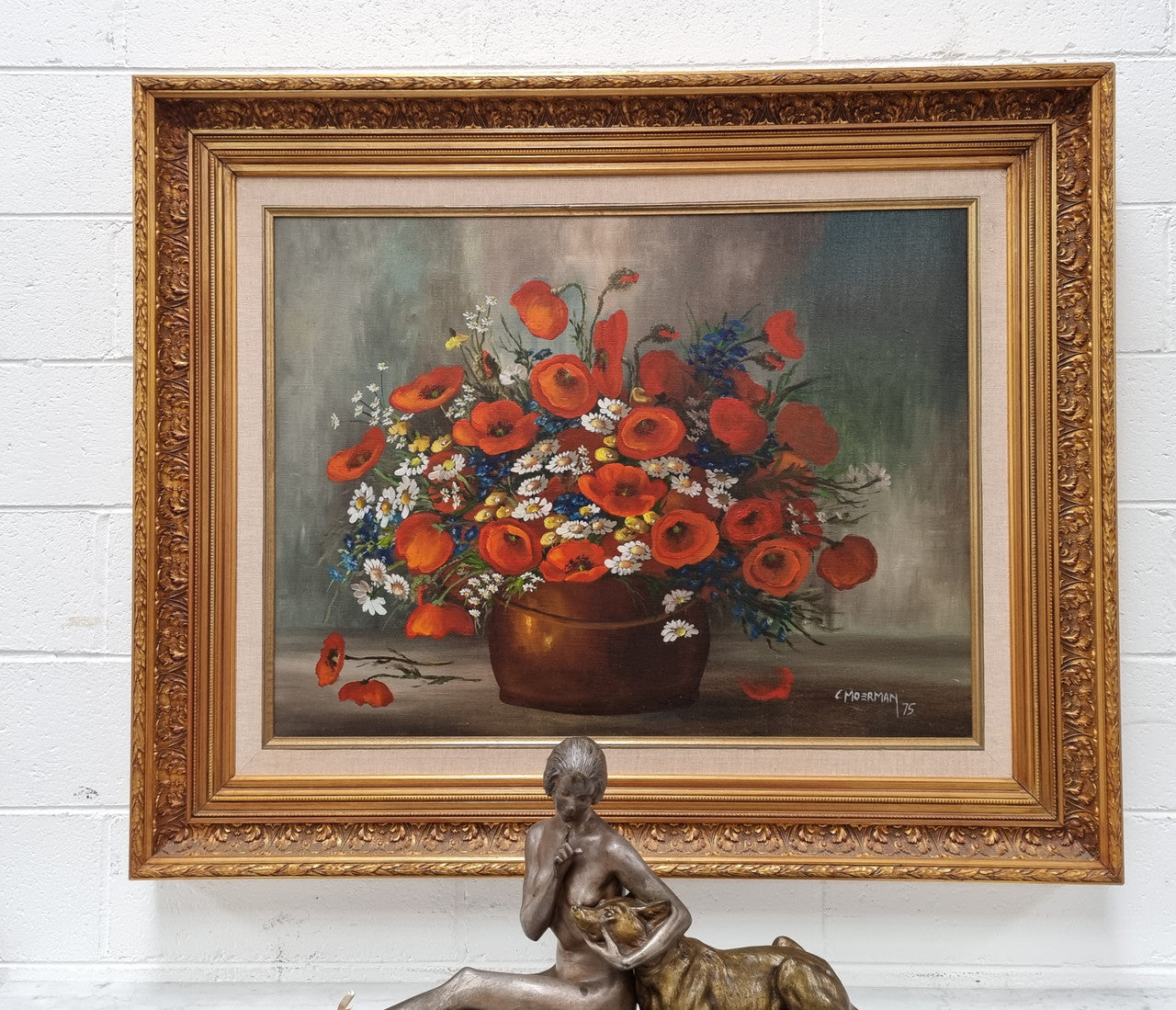 Lovely Vintage signed floral oil on canvas of Poppies and Daisy's and in a decorative gilt frame . In good original detailed condition.
