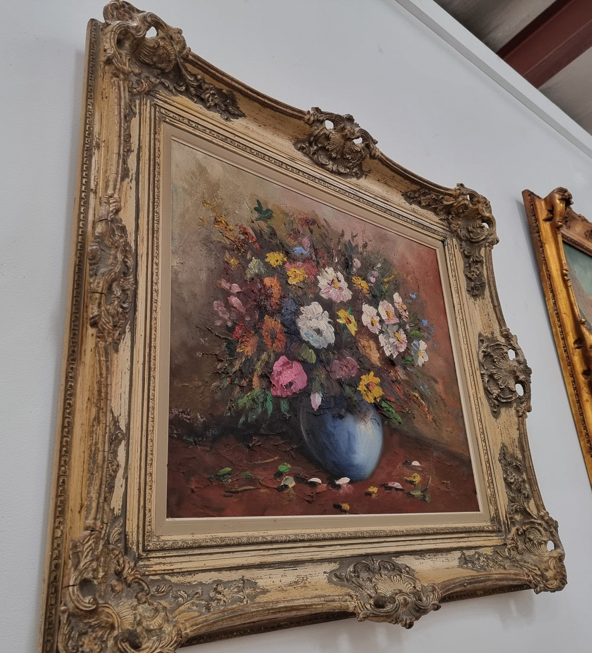 A beautiful sourced in France Floral oil on canvas in an ornate decorative frame. In good original detailed condition.