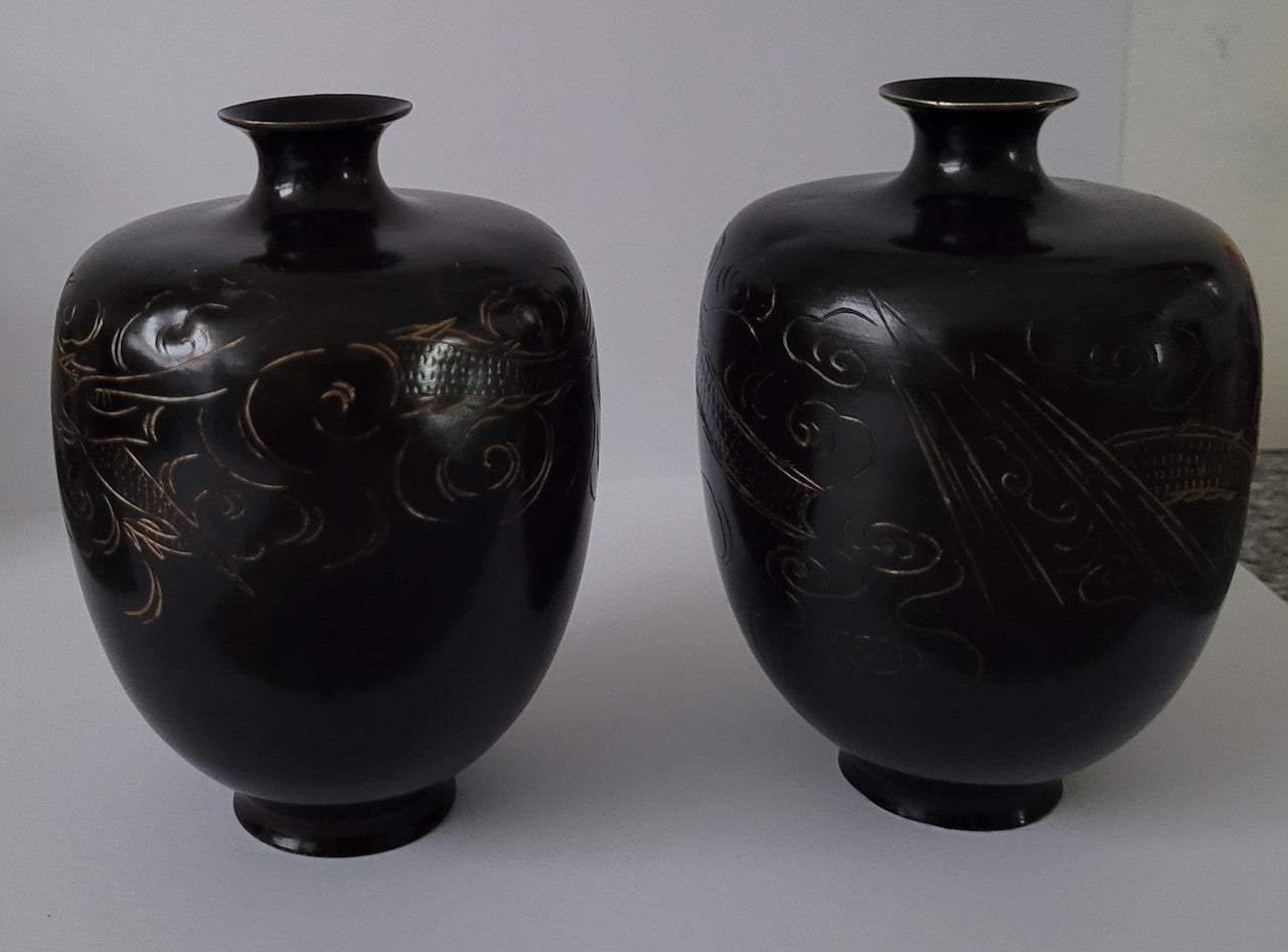 Pair of Antique Meiji Period Japanese etched Bronze vases. It is in good original condition, please view photos as they help form part of the description.