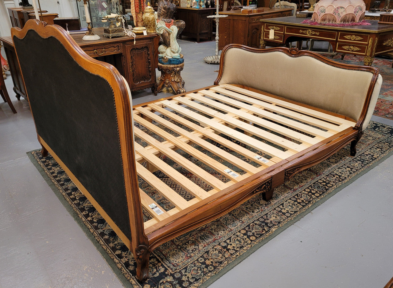 French Louis XV style queen size upholstered bed. Upholstery is in good condition and bed is complete with custom made slats. Just place your mattress on top.