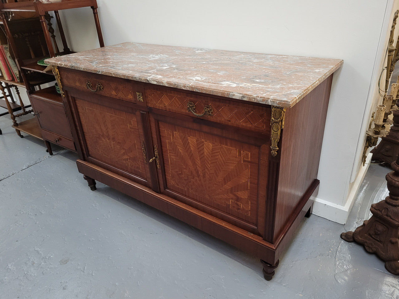 Louis 16th style Mahogany marble top cupboard and two drawers with decorative marquetry inlay and gilt bronze mounts. In good original detailed condition.