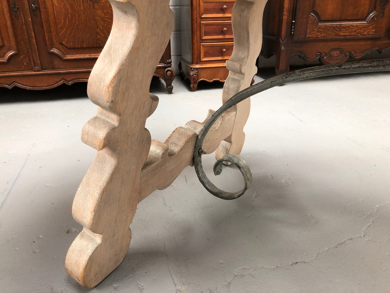 Limed French Oak Farmhouse table with decorative iron base. In good original detailed condition.