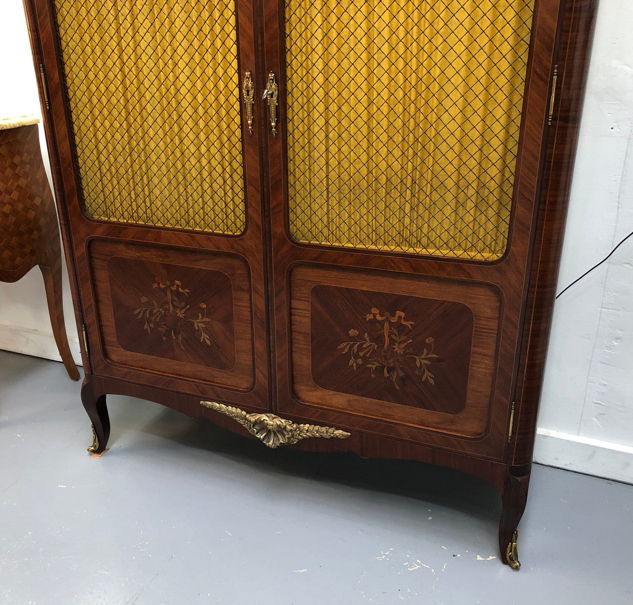 Beautiful 19th Century French Louis XV style Mahogany Blind Bookcase. This piece has lovely inlaid doors and ormolu mounts, marble top and four adjustable shelves. In good original detailed condition.
