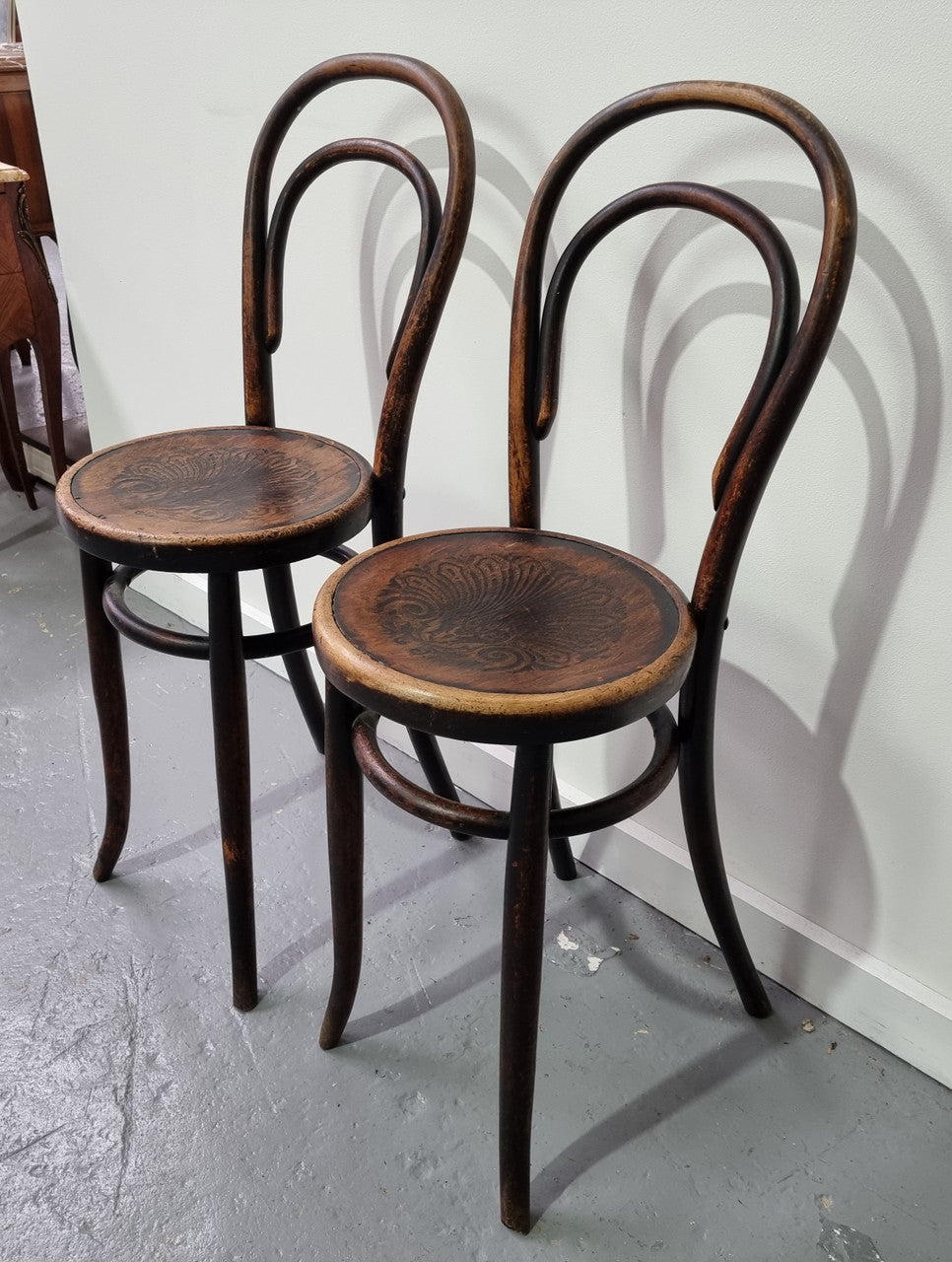Rare petite cafe Bentwood chairs with original shell embossed seats. They are in very good original condition. They would make great addition to your breakfast bar.