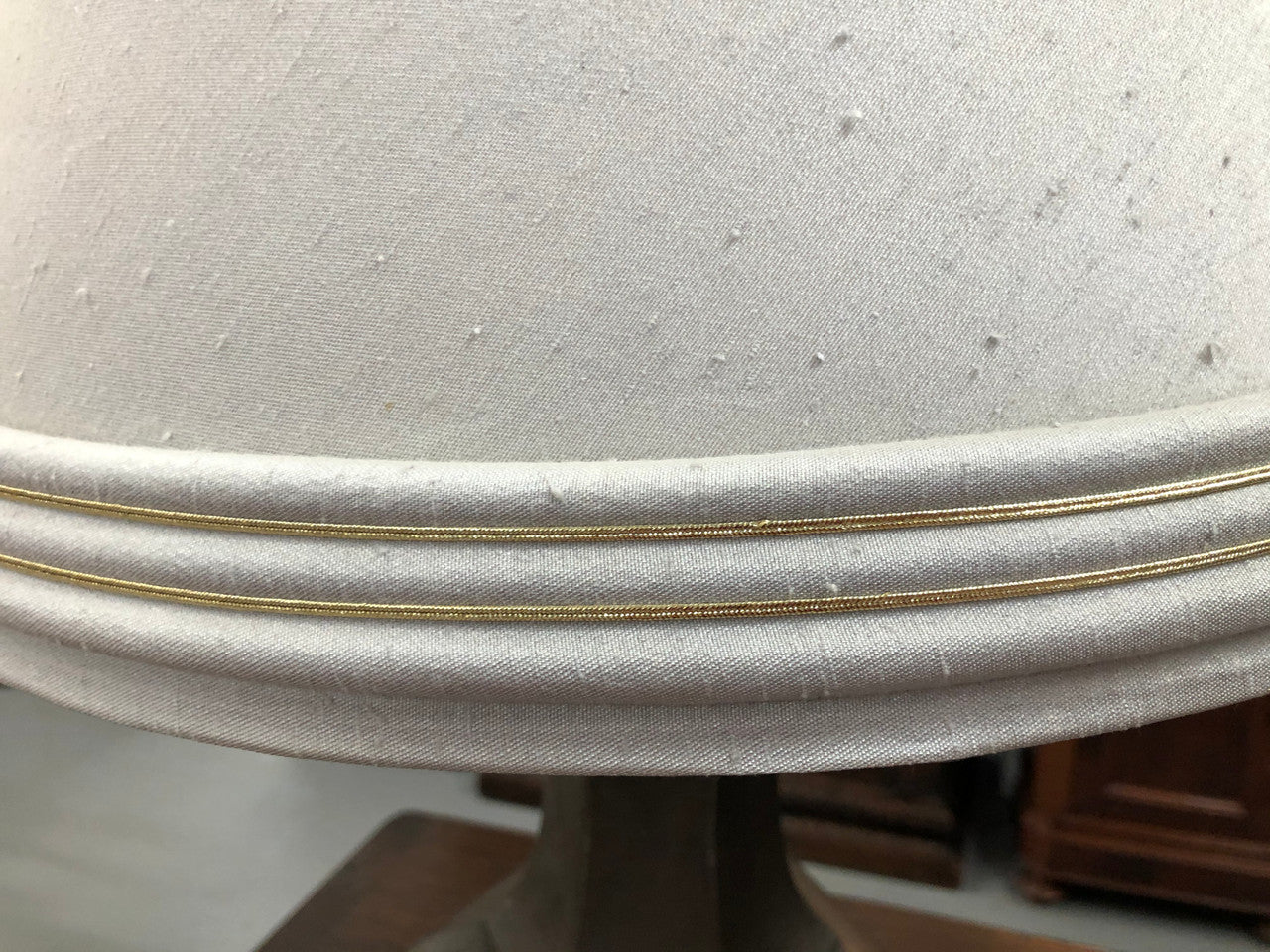 Beautiful pair of 19th Century pewter covered Bronze table lamps with light grey shades .They have been rewired and in good working order.