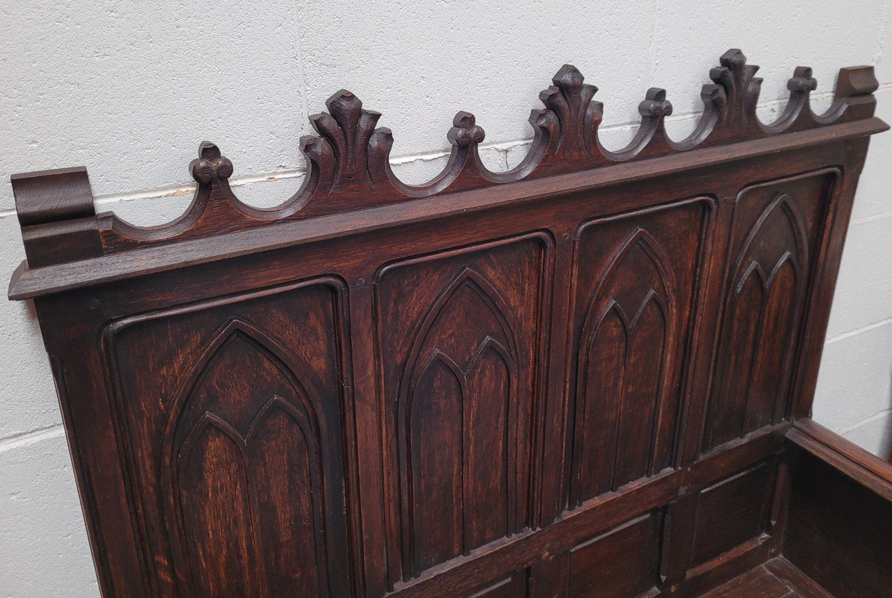 French Oak 19th Century gothic style high backed hall seat. Amazing detailed carving and is good detailed condition.