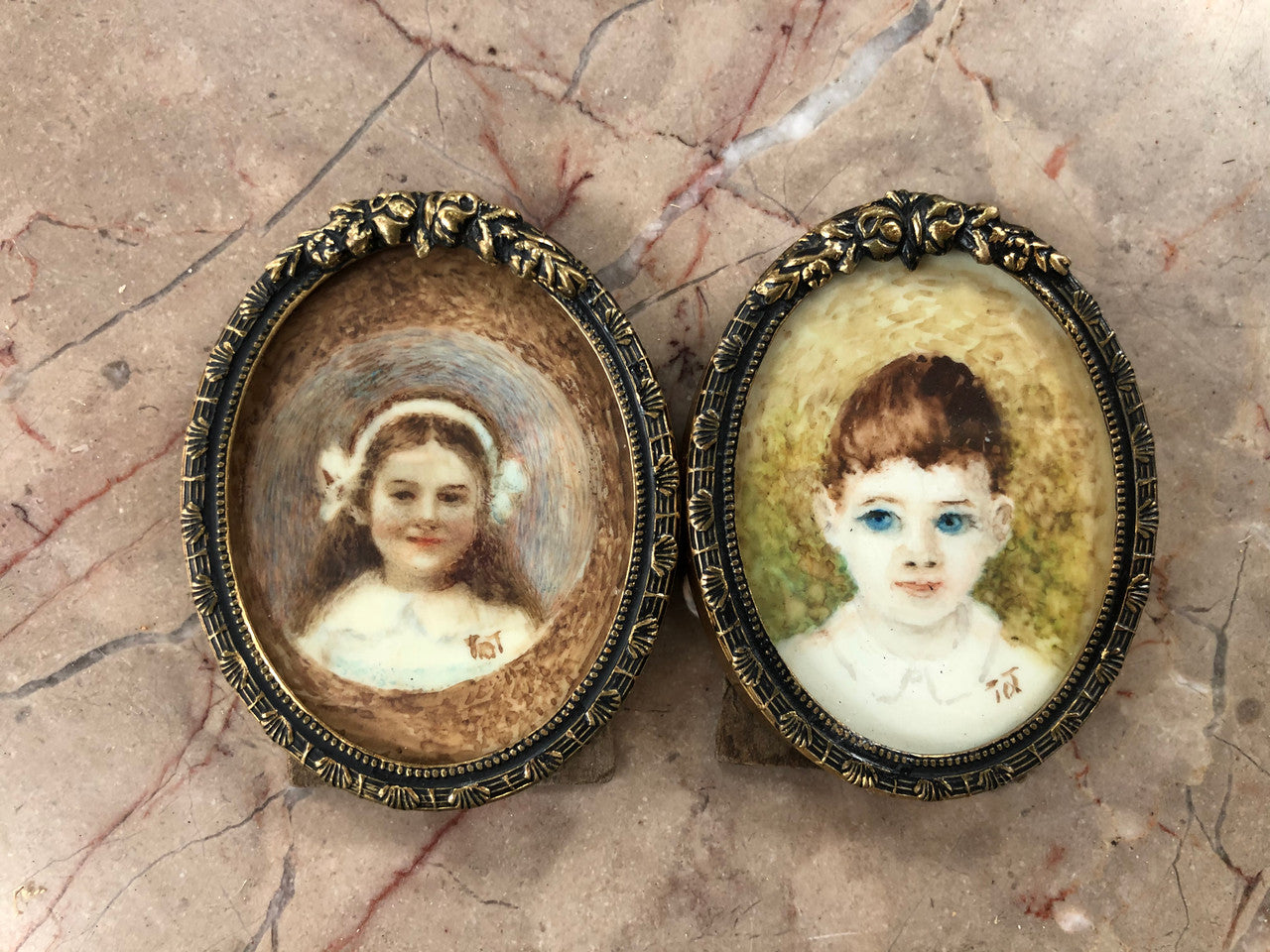 A pair of hand painted & signed miniatures in frames. They both still contain original stickers on back of frames "Danish Design" and are in amazing original condition.