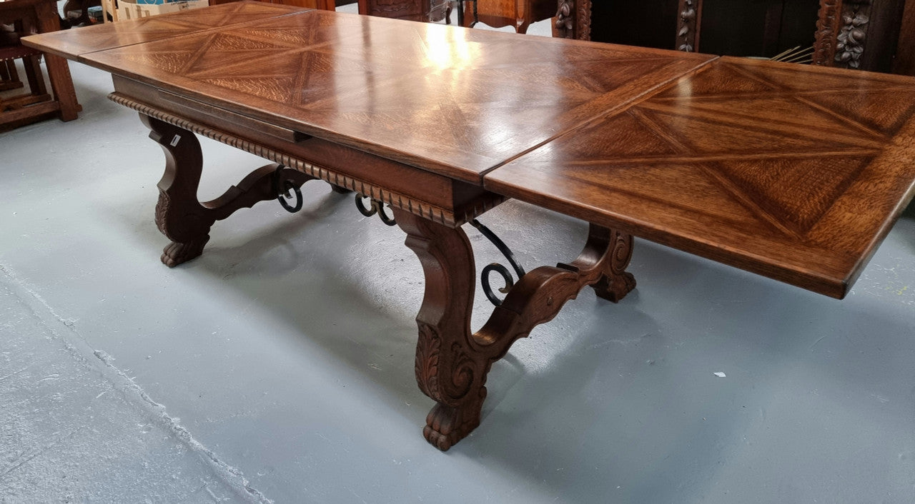 French Spanish style Oak parquetry top extension table. In good original detailed condition.