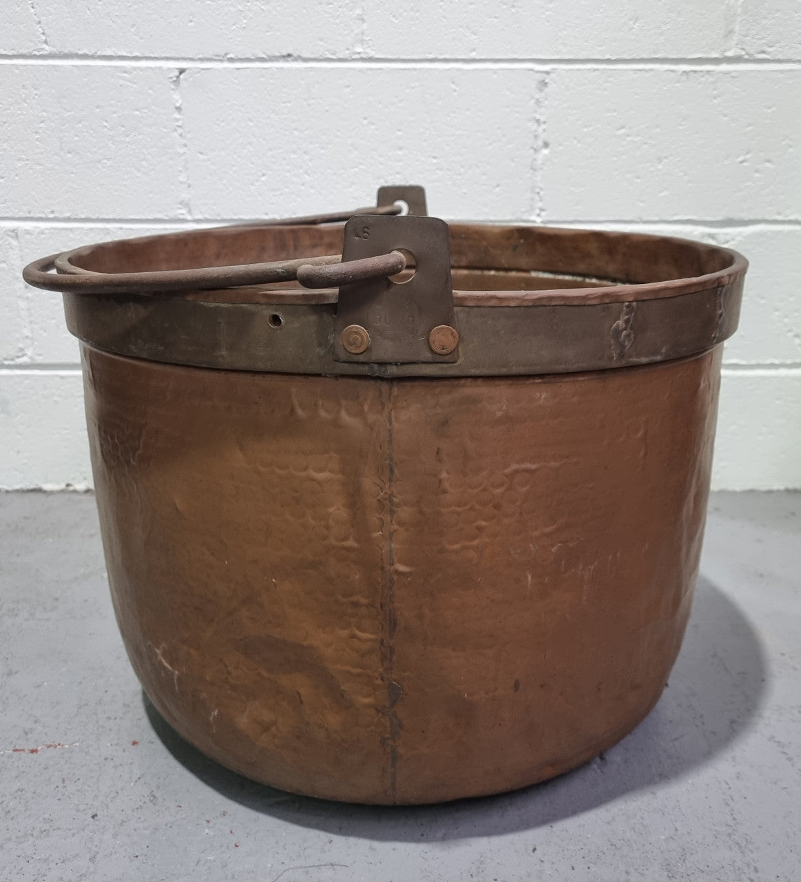 Large Antique French copper cauldron with metal band around rim. It is in good original condition.
