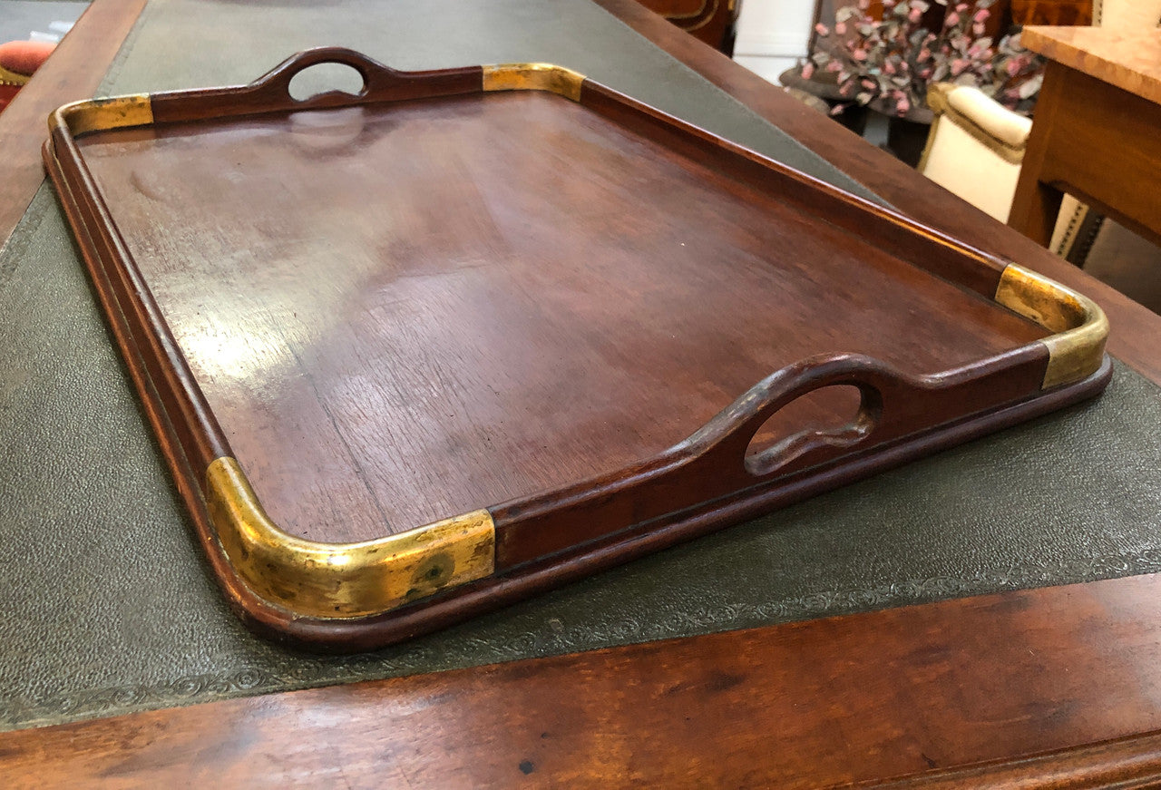Beautiful Edwardian Mahogany and brass bound tray in good original detailed condition.