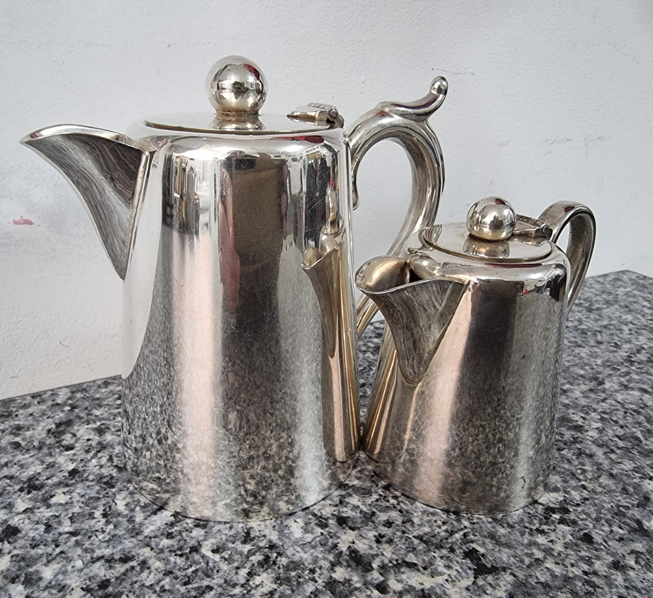 Pair of Vintage Silver-Plate water and milk jug. In good condition please view photos as they help form part of the description.