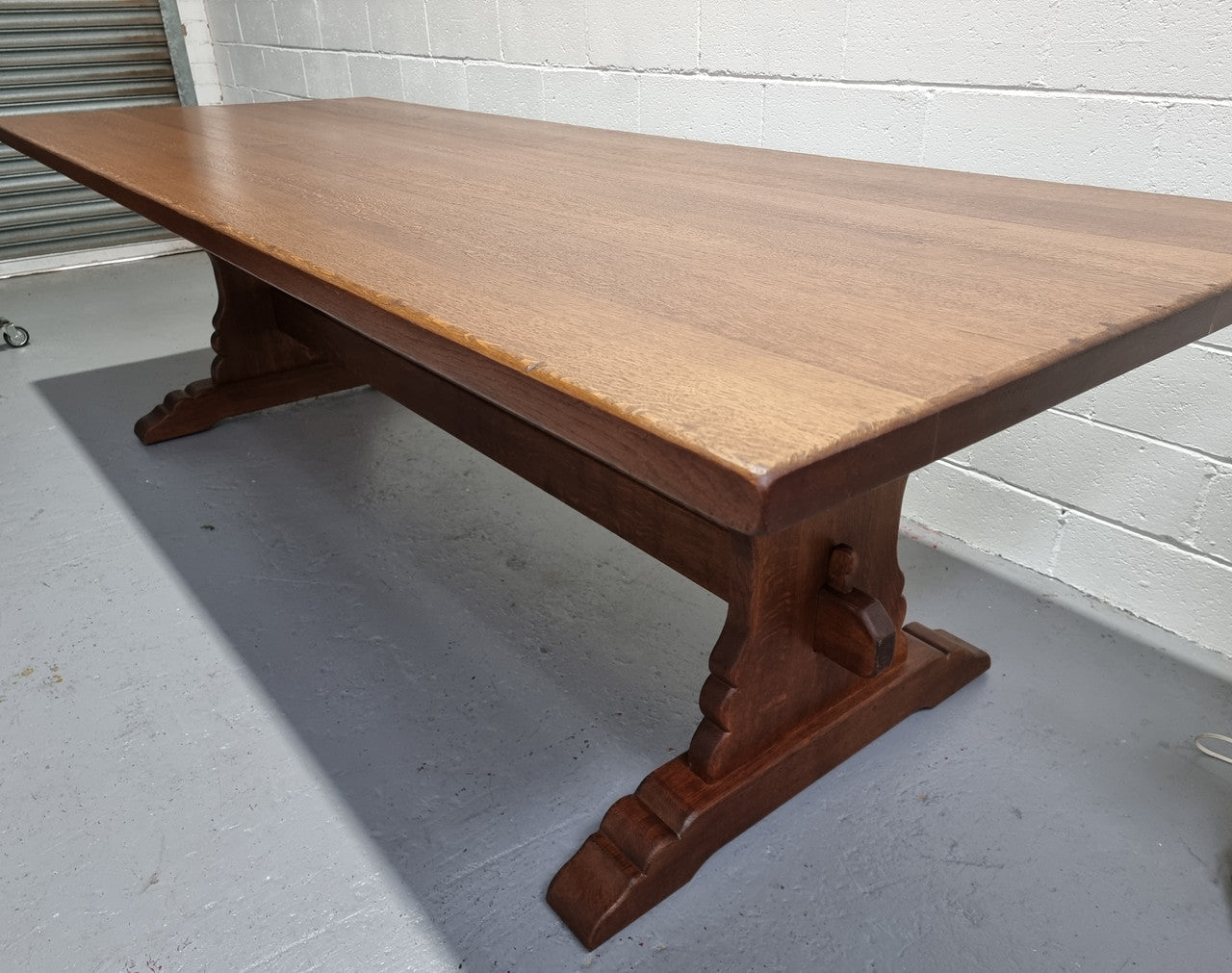 Sensational long French Oak farmhouse table of large proportions on a stretcher base. It has been fully restored with a hard oil water resistant finish. This fabulous table would seat 10 to 12 people.