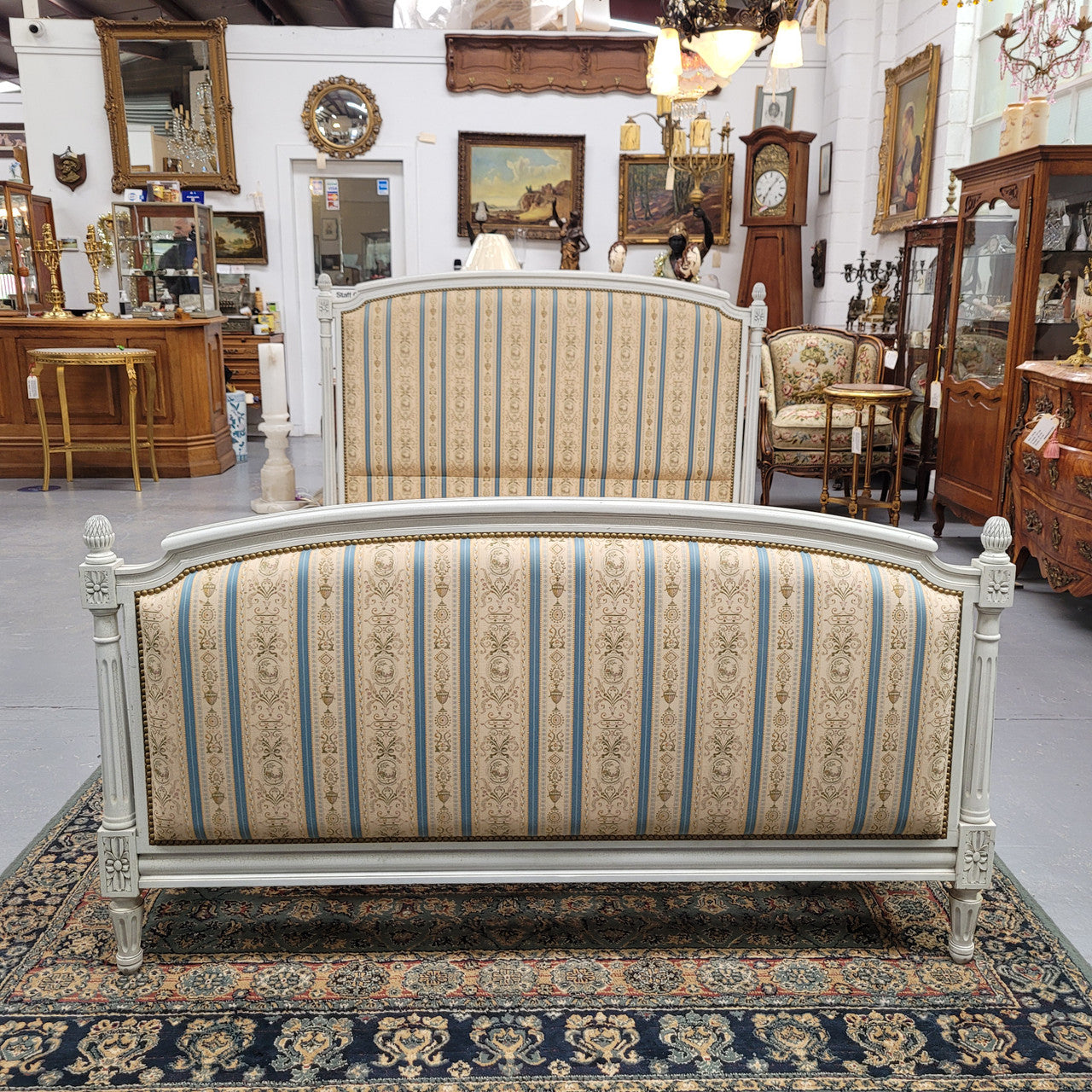 French Louis 16th style double bed and rails with original crackle paint. It also has good quality upholstery. Bed comes complete with custom made slats. Just place your mattress on top. Sourced from France and in good original detailed condition.