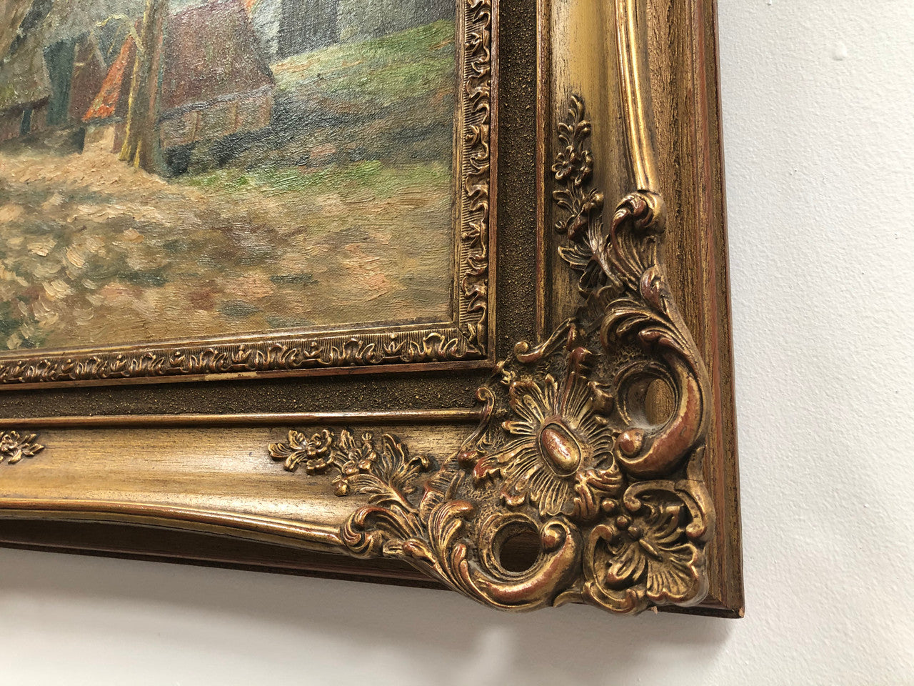 Sourced in france is this beautiful signed Dutch oil on canvas of a farm scene framed in a ornate frame. In good original condition.
