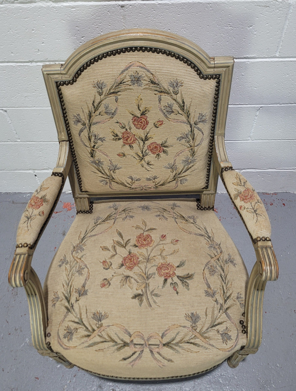 Lovely French Louis XVI style painted and Tapestry upholstered fauteuil. In good original condition, and very comfortable.