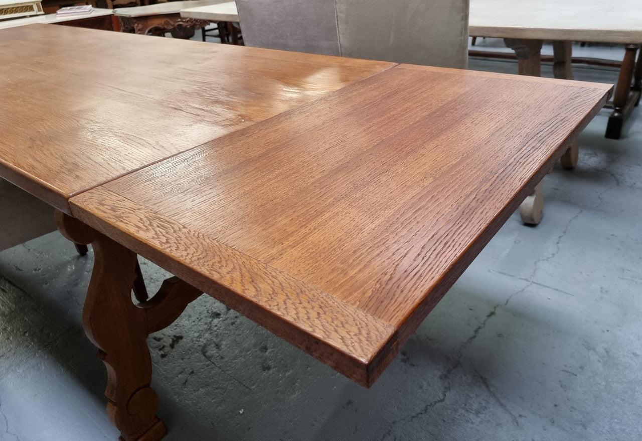 French light Oak Spanish style extension table. In good restored condition.