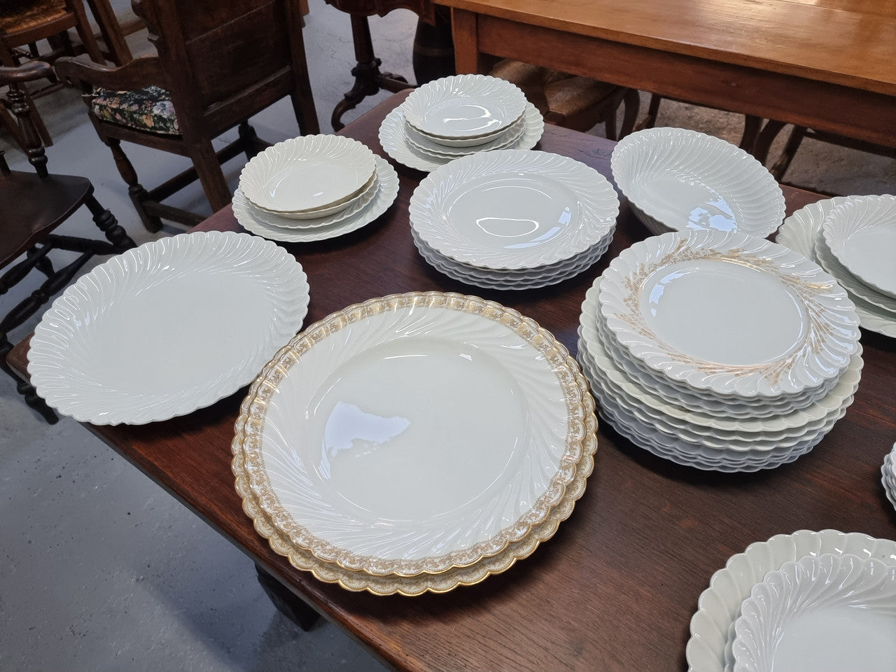 Limoge "Haviland" large white part dinner service. Includes some white service with gilt decoration. Although most items are in good condition please note two plates do have small chips. We are able to supply more photos on request.