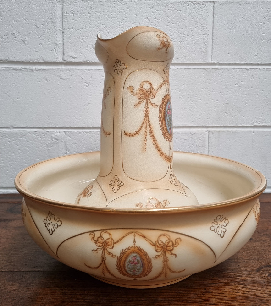 Charming large Crown Devon jug and basin set. Muted colors featuring garlands and floral medallions “Festoon Pattern” No chips or cracks in good condition commensurate with age