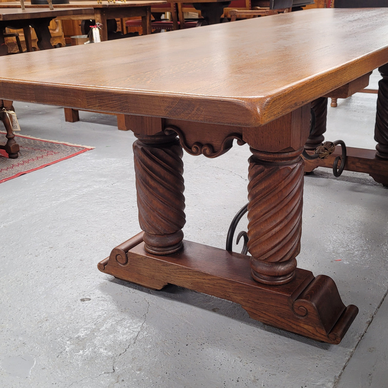 Amazing French Oak Spanish Renaissance style dining table with beautiful decorative iron work. It has been sourced from France and can comfortable seat 8- 10 people. Sourced from France and is good original detailed condition.