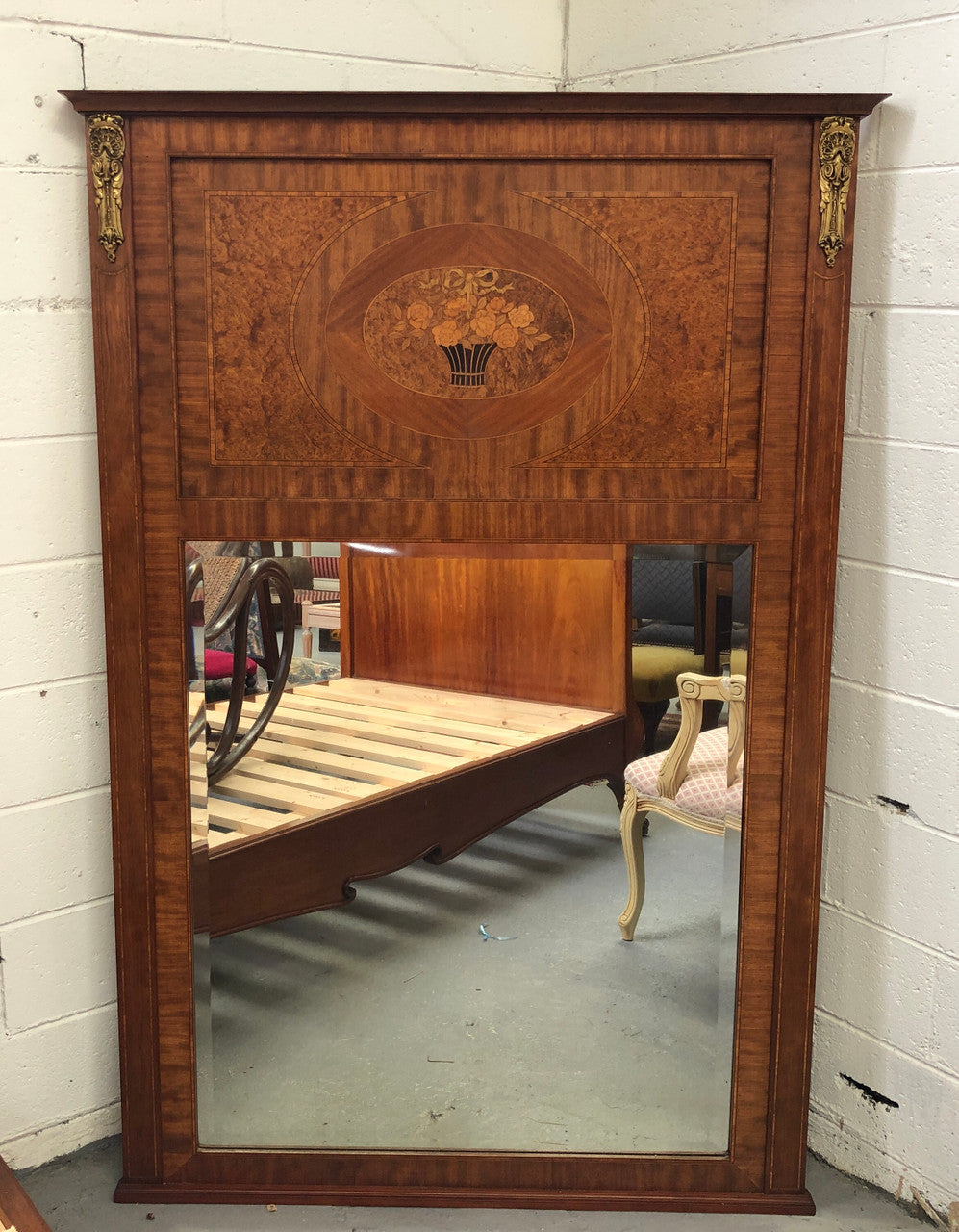 Beautiful Amboyna and Walnut Trumeau mirror. Has lovely parquetry inlay and is in good original condition.
