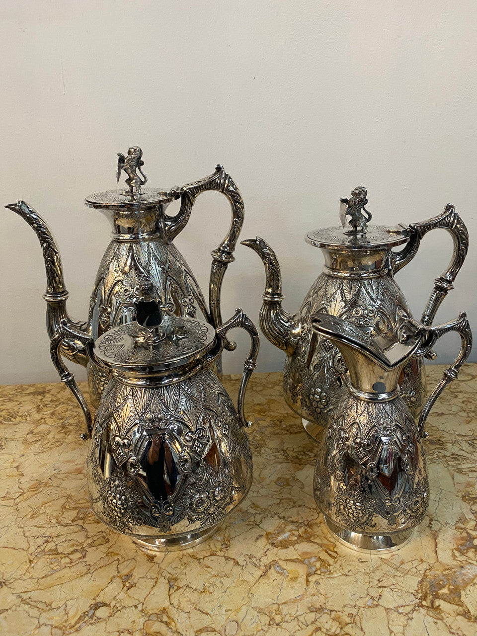 Amazing Quality Sheffield Plate Tea & Coffee Service By Walker & Hall
Gorgeous heavy quality Sheffield plate, tea & coffee service with lion finials.
The set is of the highest quality & has beautiful fine chasing & repoosse work. In very good original condition