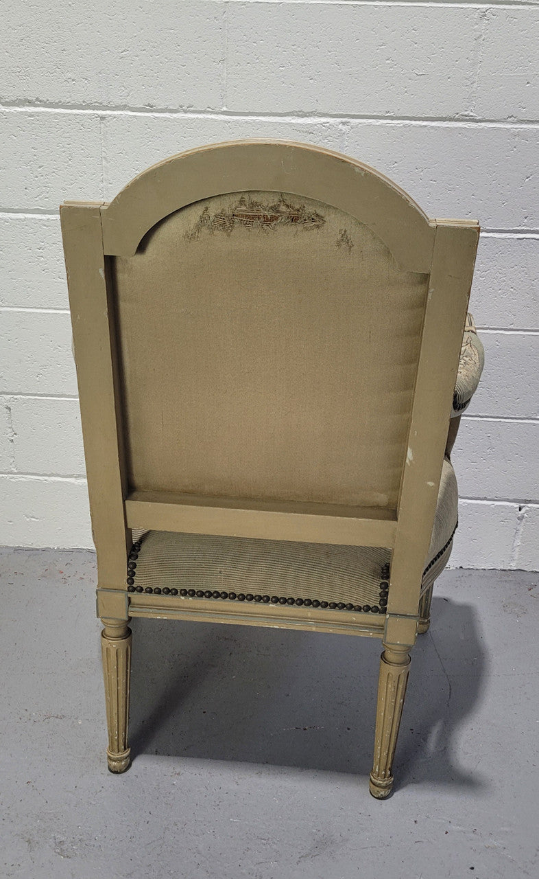 Lovely Louis XVI style painted fauteuil with lovely sage coloured tapestry upholstery. In good original condition.