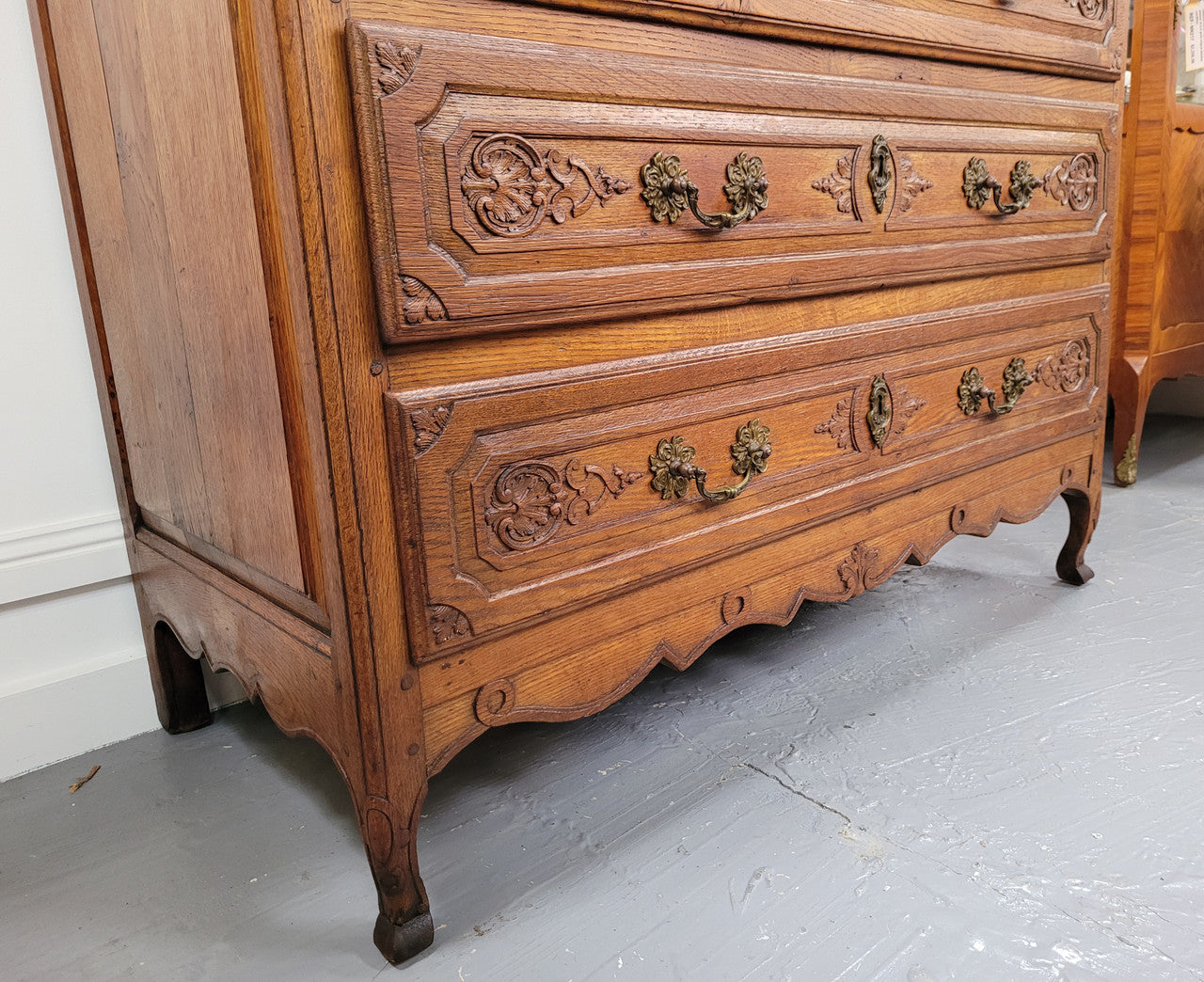 French Louis 15th style large three drawer chest featuring carved drawers. It has been sourced from France and is in good original detailed condition.