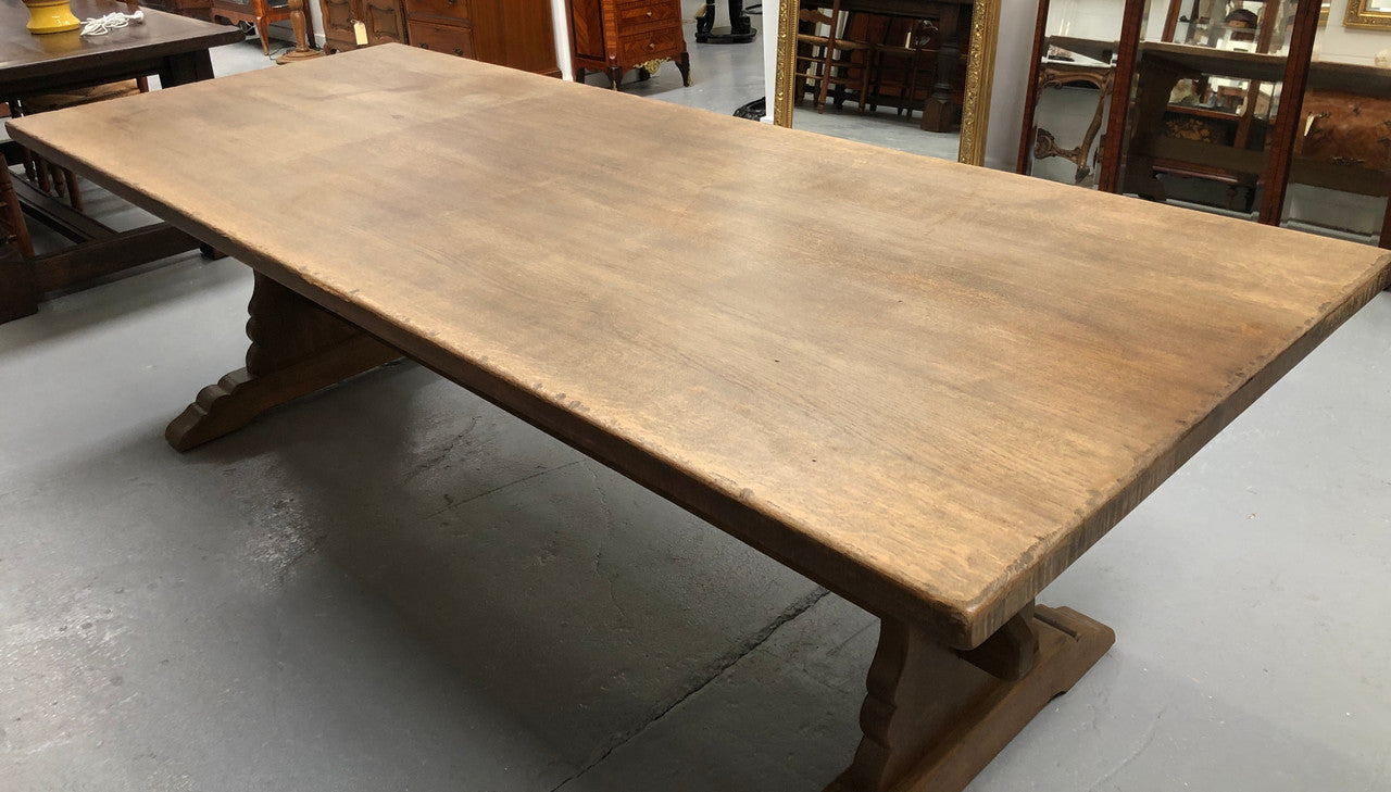 Lovely long French light oak Farmhouse table with a good thick plank top and beautiful stretcher base. Can seat 12 people very comfortable and is in good original condition.