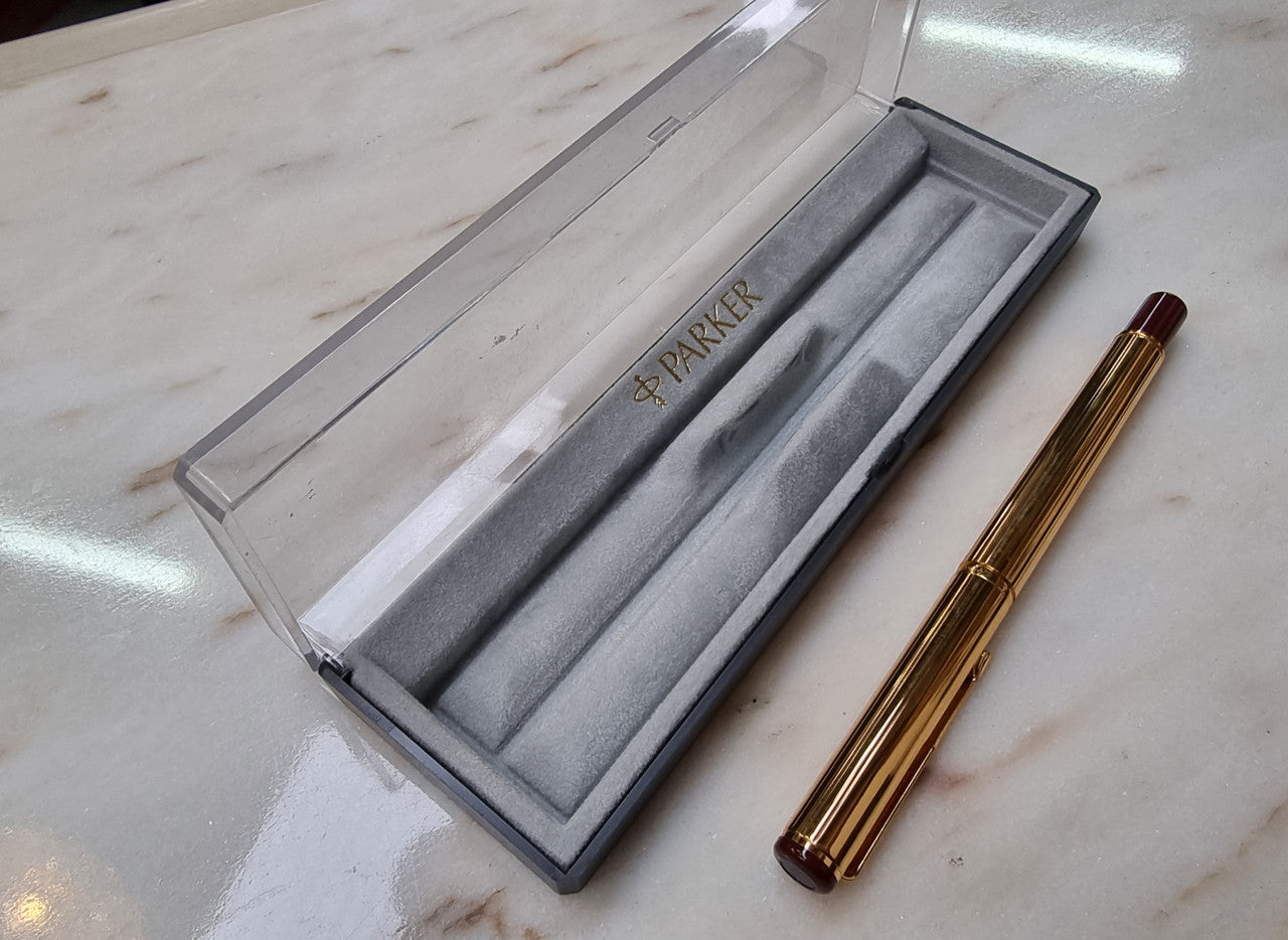 Parker 22 carat gold plated ball point pen in its box.