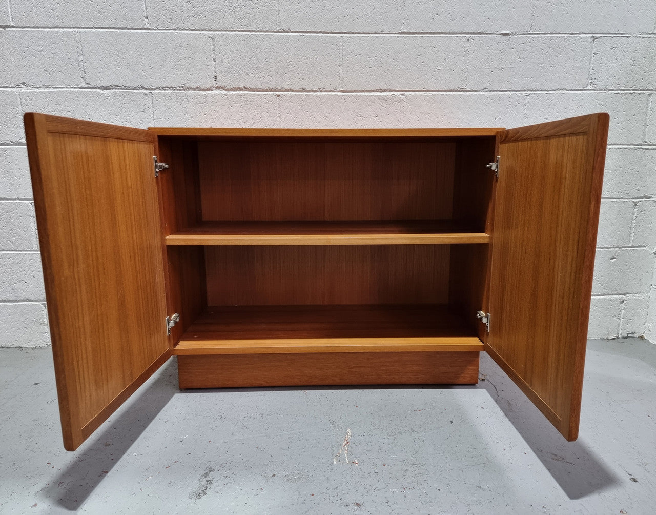 Lovely Vintage Teak two door cabinet ideal for a television cabinet in good original condition.