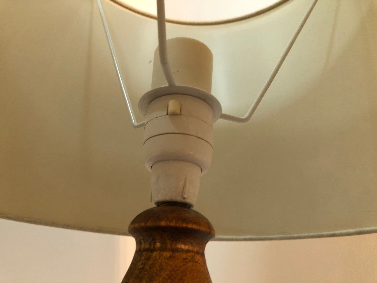 Tudor style Oak standard lamp, rewired and with foot switch. In good original condition.