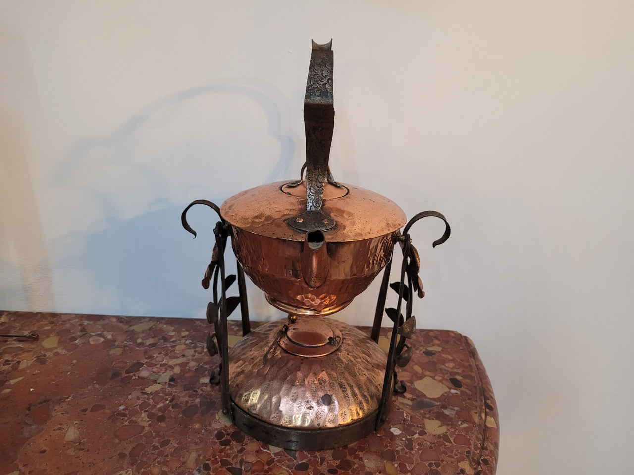 Art Nouveau style rustic Copper kettle on stand. Decorative only.