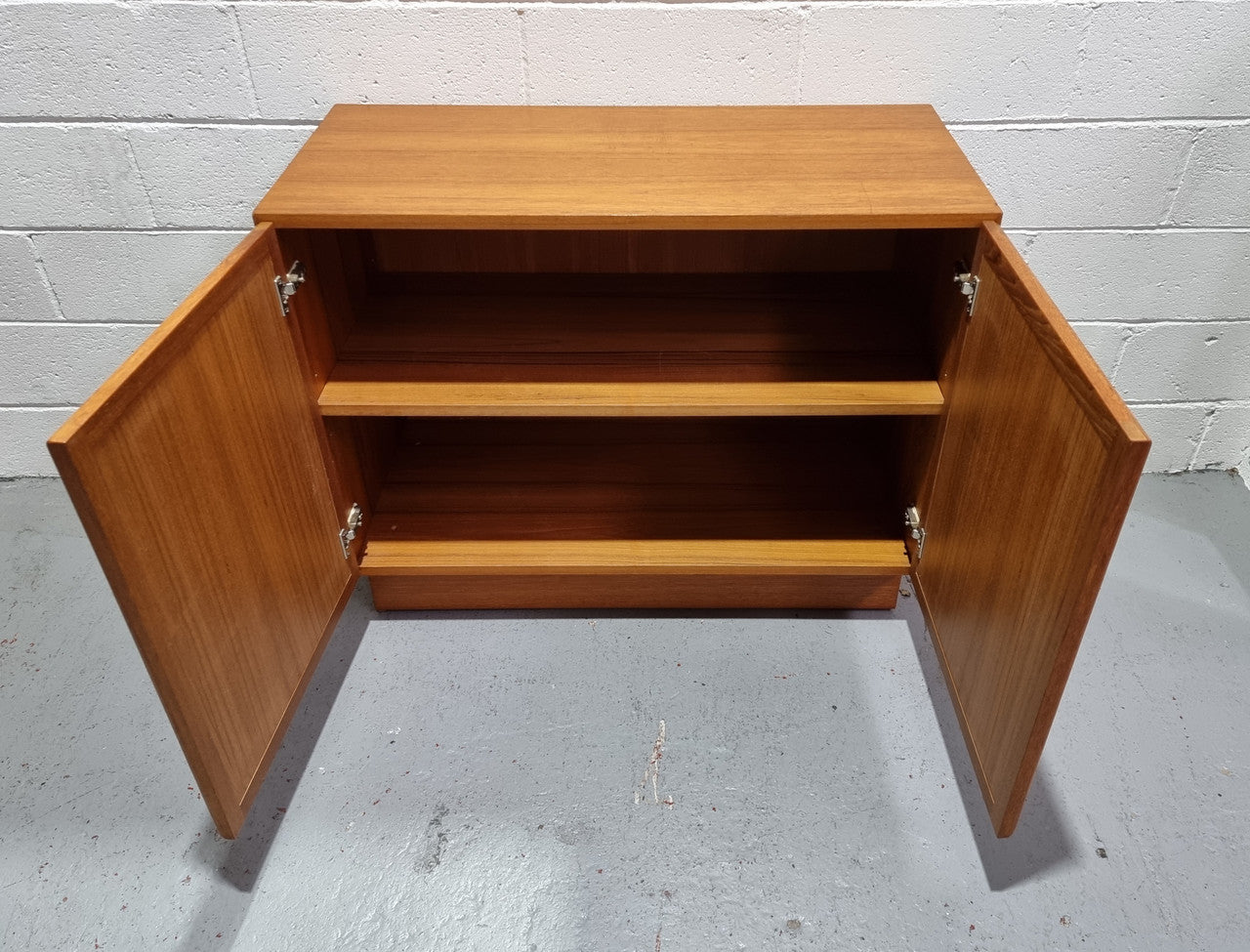 Lovely Vintage Teak two door cabinet ideal for a television cabinet in good original condition.