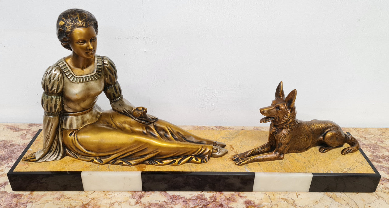 Art Deco sculpture of lovely seated lady with German Shepherd signed by signed by H.Molins. In good original detailed condition.