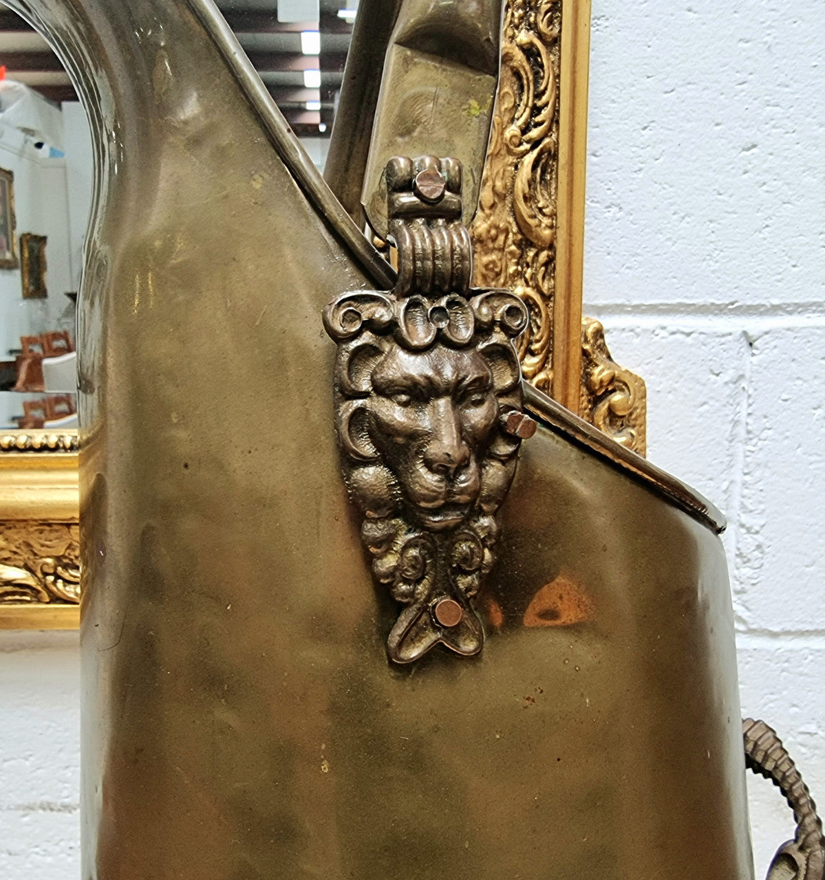 French brass coal bucket with Lion heads. In good original condition.