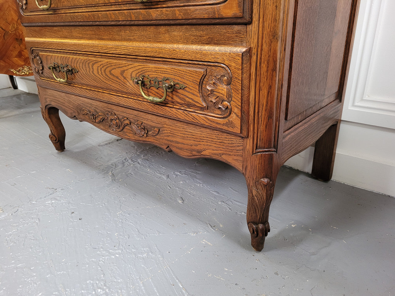 French Louis XV style Oak three drawer chest with wooden top. It has been sourced from France and is in good original detailed condition.