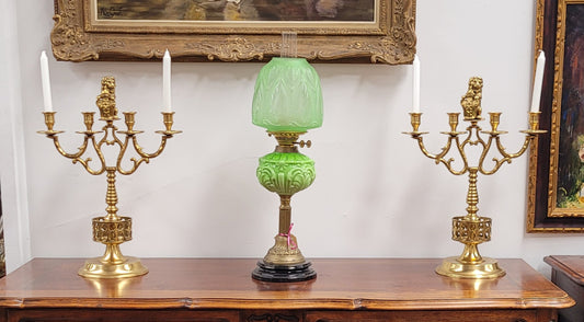 Pair of large Antique French Brass candelabras with lions. They have been sourced from France and are in good original detailed condition.