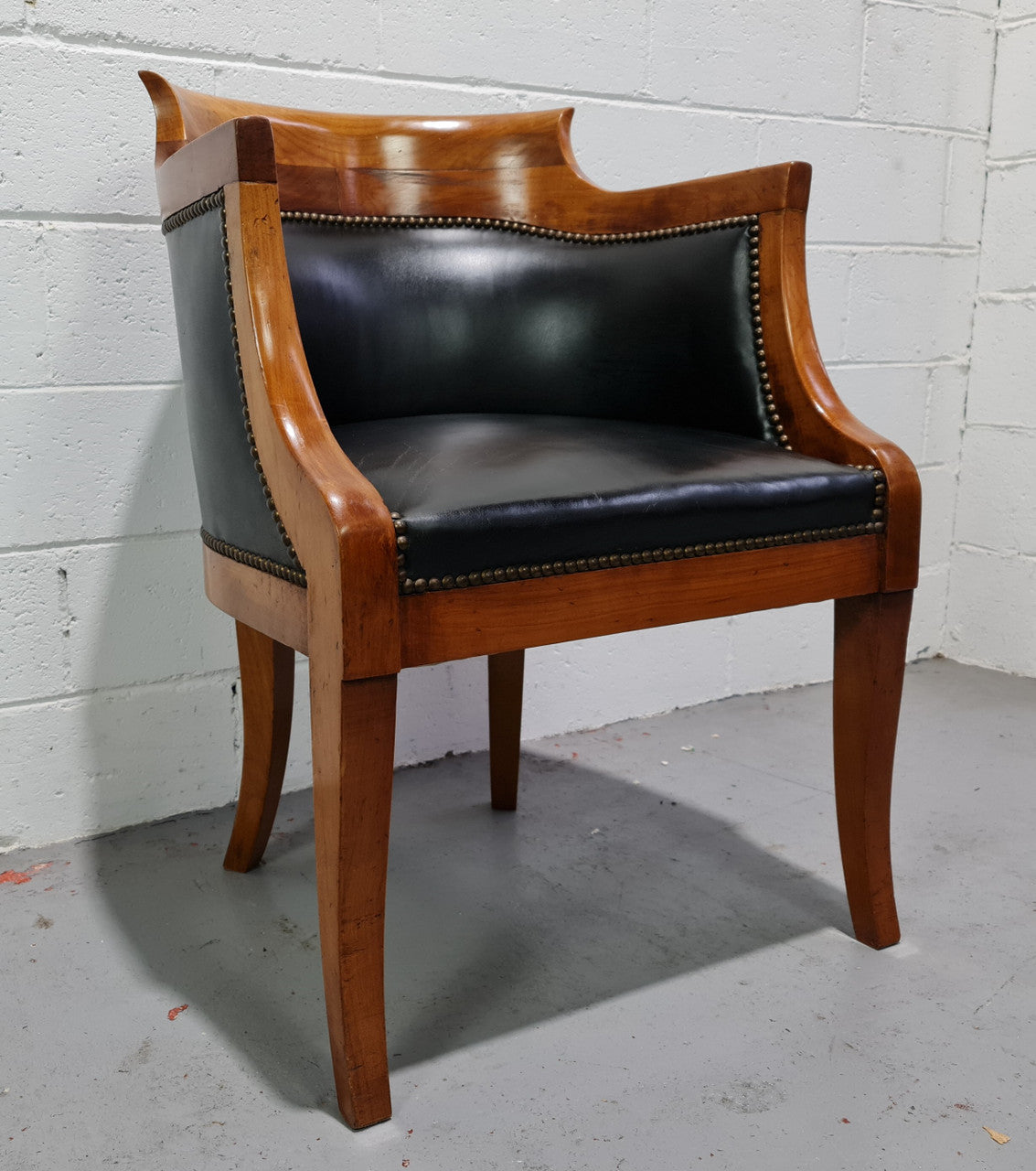 Antique Empire style Walnut and leather office desk chair. In good original detailed condition and leather is in good used condition.