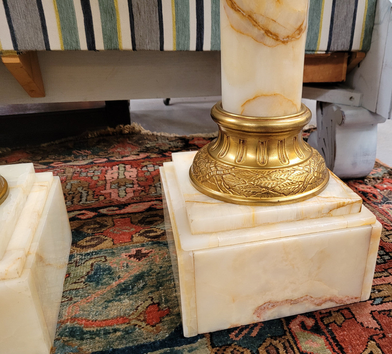 Pair of Imposing French alabaster marble and bronze pedestals. They are highly decorative and have been sourced from France. They are in good original detailed condition.