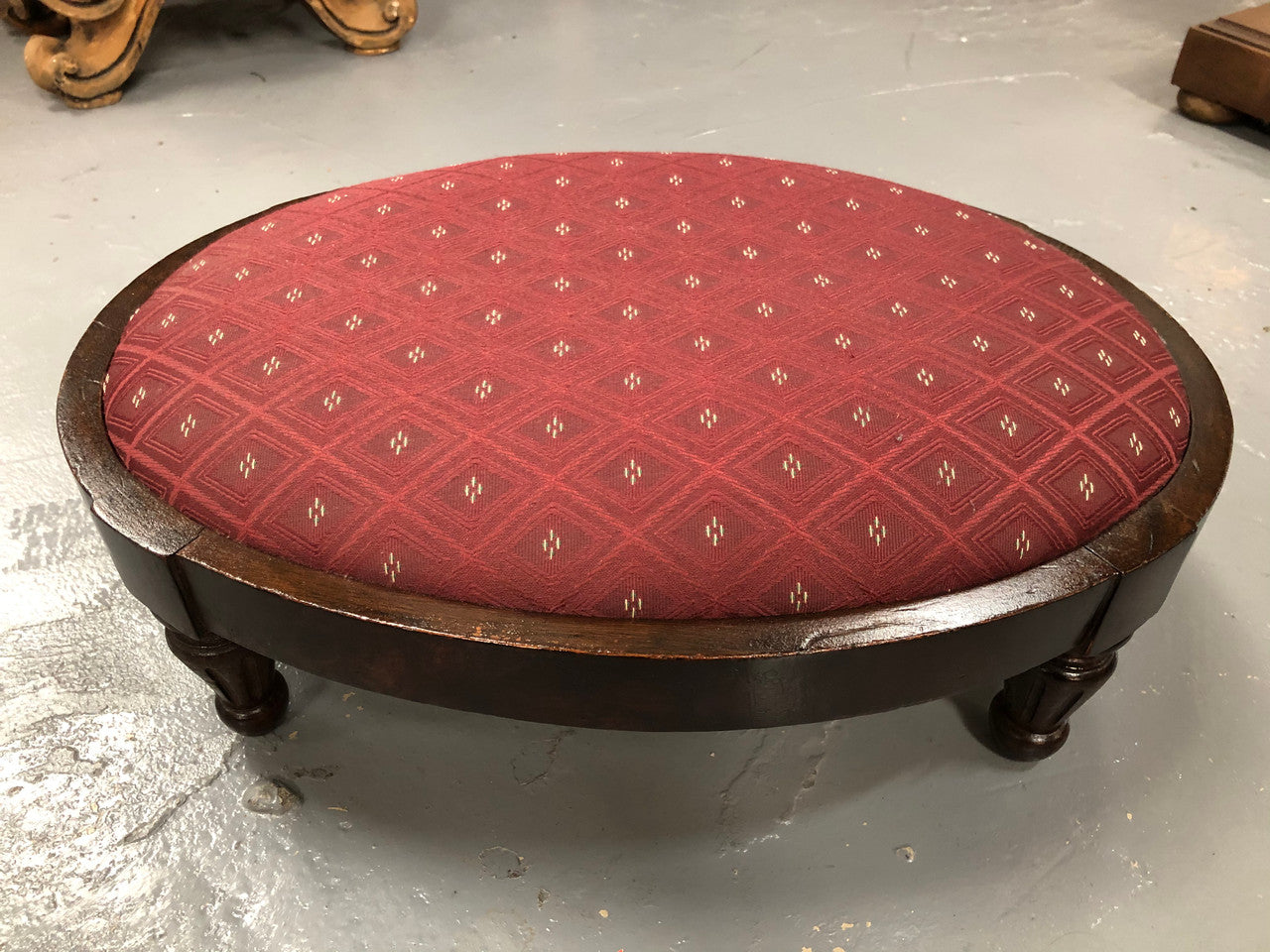 Upholstered Antique Mahogany oval foot stool. In very good original condition.
