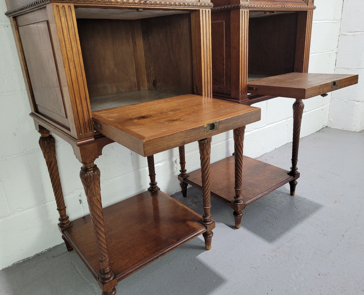 Pair parquetry Walnut bedside cabinets with white inset marble tops. In good original detailed condition.