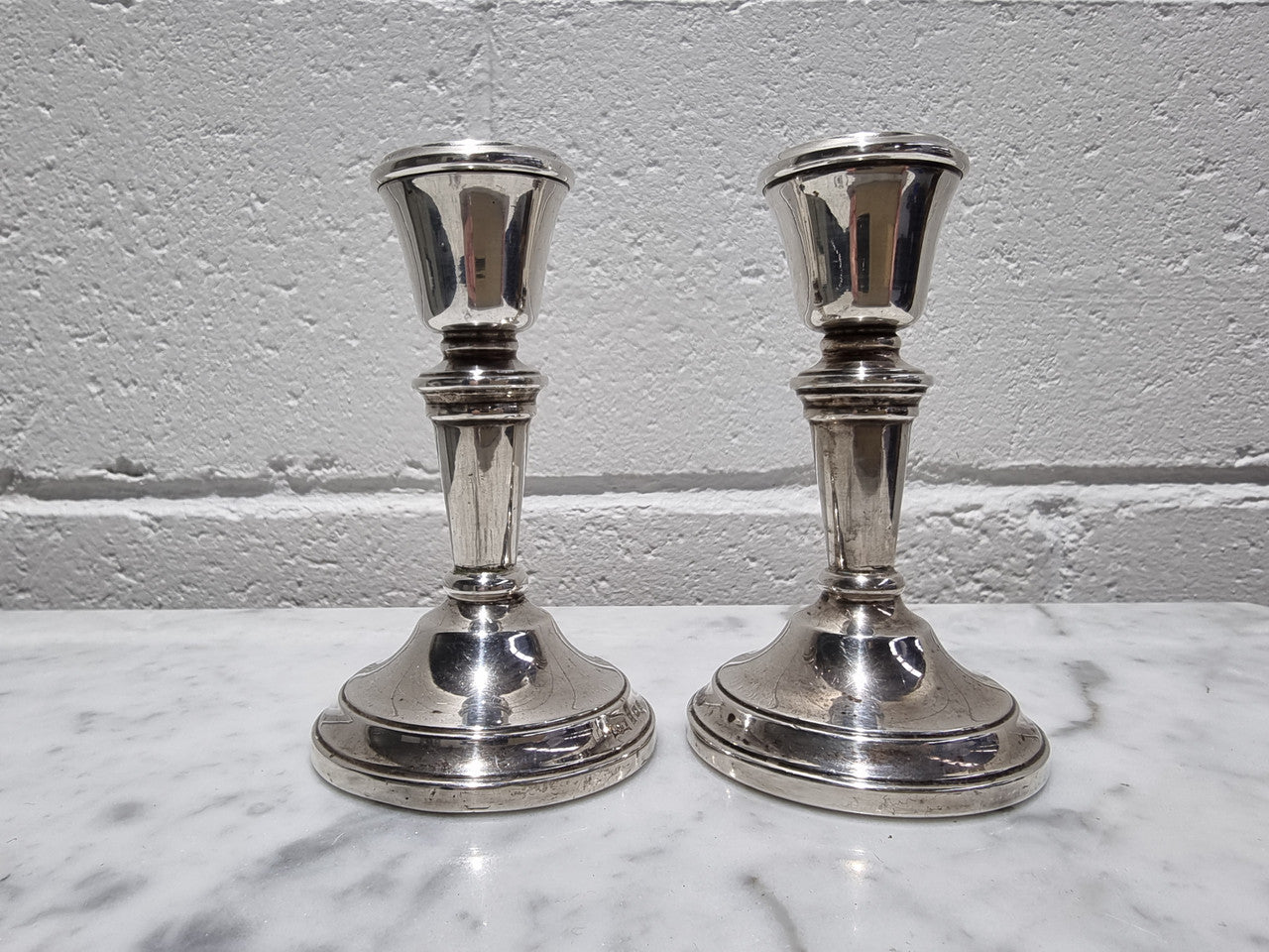 Pair of Birmingham sterling silver candlesticks date marks 1967. In good original condition, please view photos as they help form part of the description.