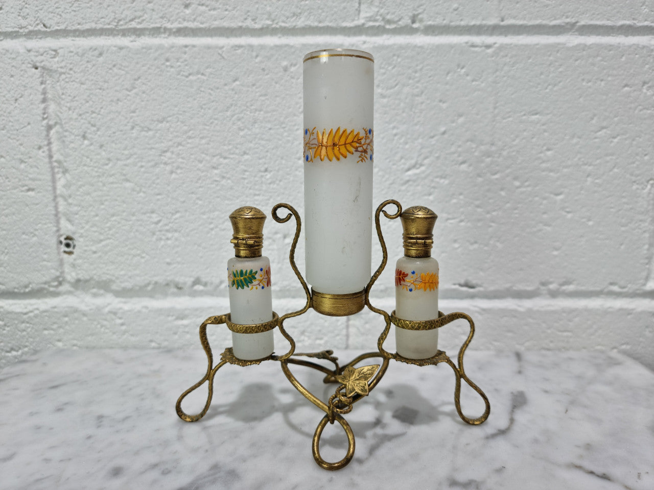 French 19th century perfume set in a gilt metal stand. Opaline glass beautifully hand painted and is in good original condition, please view photos as they help form part of the description.